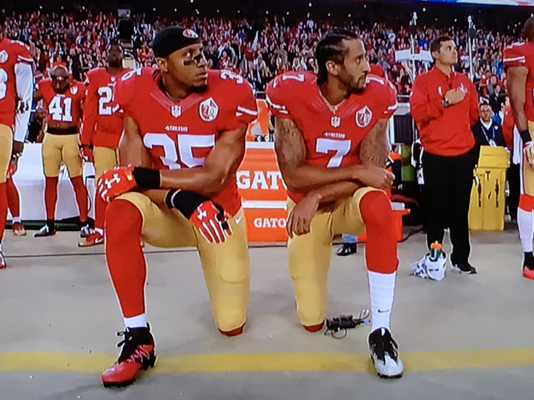 The confused NFL protester, Colin Kaepernick taking a knee in protest.